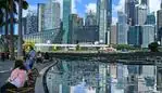 To zdjęcie zrobione 14 czerwca 2021 roku przedstawia ludzi siedzących nad stawem z widokiem na panoramę Singapuru.  - W Singapurze ma zostać uruchomiona giełda finansowa oferująca kredyty węglowe i inwestycje w projekty ochrony, ale może mieć trudności z przekonaniem sceptyków do wartości kontrowersyjnych kompensacji emisji.  (Zdjęcie: Roslan RAHMAN / AFP) / ZAPRASZAMY NA rynkowy klimat Singapuru, FOCUS Martina Abbugao i Sama Reevesa